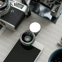 עדשת מצלמת טלפון נייד חיצונית גנרית אורות צבעוניים בזווית רחבה על היופי של חפץ עצמי