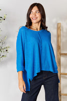 Zenana pletena majica pune veličine s okruglim izrezom i visokim prorezom
