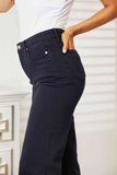 Niebieskie, barwione, szerokie dżinsy Judy w pełnym rozmiarze, z wysokim stanem i wyszczuplającym brzuch