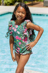 Marina West Swim Bring Me Flowers V-aukkoinen yksiosainen uimapuku Sagessa
