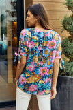 Petal Dew full-size blouse met V-hals en strikdetail
