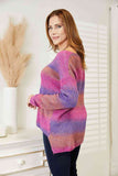 Dvigubos spalvos įvairiaspalvis megztinis su V formos iškirpte